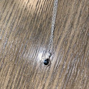 Kendra Scott silver necklace with Tiny Black stone